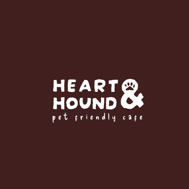 Heart & Hound reversed logo on chocolate brown